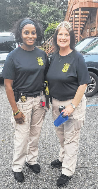 <p>Tierra Wingate and Tara Funderburk with Probation and Parole took a pause to pose</p>