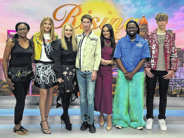 131823164_web1_fashion_1
McDonald with models of his brand.
Courtesy photo