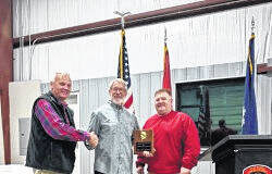 
			
				                                Firefighter of the Year Bill Cockshutte (center) Chief Bill Floyd (left) and Captain Donald Hamilton (right).
                                 Submitted

			
		