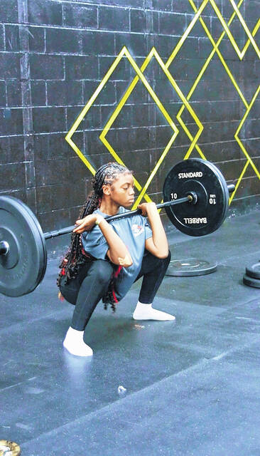 Iyanna Holder power cleans 85 lbs.
                                 Demarco Bostic | The Herald-Advocate