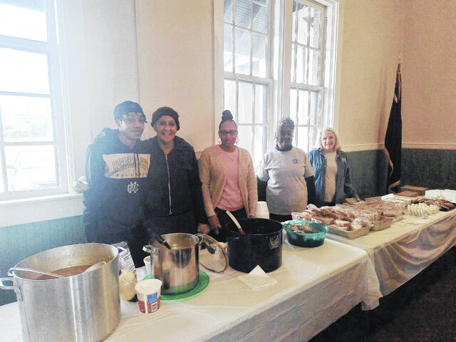 <em>Pictured left to right</em>: Marlboro Co. High School Sr. Ledarius Brown volunteering on behalf of BETA club, Ms. Julia Meeks, Ms. Angela Rossianno, Ms. Frances Moody, and Ms. Verda Sullivan.
                                 Lauren Monica | Herald-Advocate