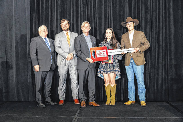 Walt and Casey Calhoun, of Marlboro County, won the 2026 Young Farmers and Ranchers Excellence in Agriculture Award. Pictured with SC Farm Bureau President Harry Ott, State YF&R Committee Chari heath Wilson, and Frank Blossman with Southern Farm Bureau Life Insurance Company.