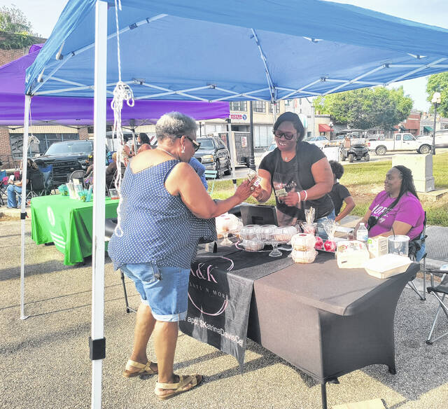 Katrina McRae, owner and operator of K&K Treats, and More said the day blessed both her soul and her wallet.
                                 Lauren Monica | Herald Advocate