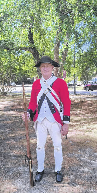 Filling in for the British Saturday as a redcoat, Robert McLeod said history is a passion of his and he got his start in reenacting ten years ago, when a fellow actor encouraged him to give it a try.