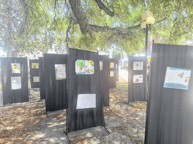 The theme of Beevilles student art competition was A Day in Beeville, celebrating bees, honey, pollinators, flowers, and the spirit of the festival. Sixty student artwork pieces were displayed in an outdoor gallery during the event.
                                 Lauren Monica | Herald- Advocate