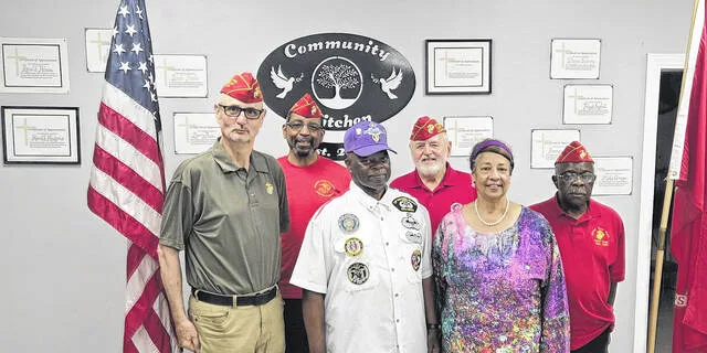 From left, Marine Bob Rollston, Marine Melvin Dease, Army First Sergeant Swift, Marine John Harlow, Sheila Swift, and Marine Larry Pouncy.
                                 Courtesy photo