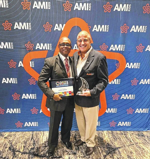 McNeil earns AMIkids award for building community support